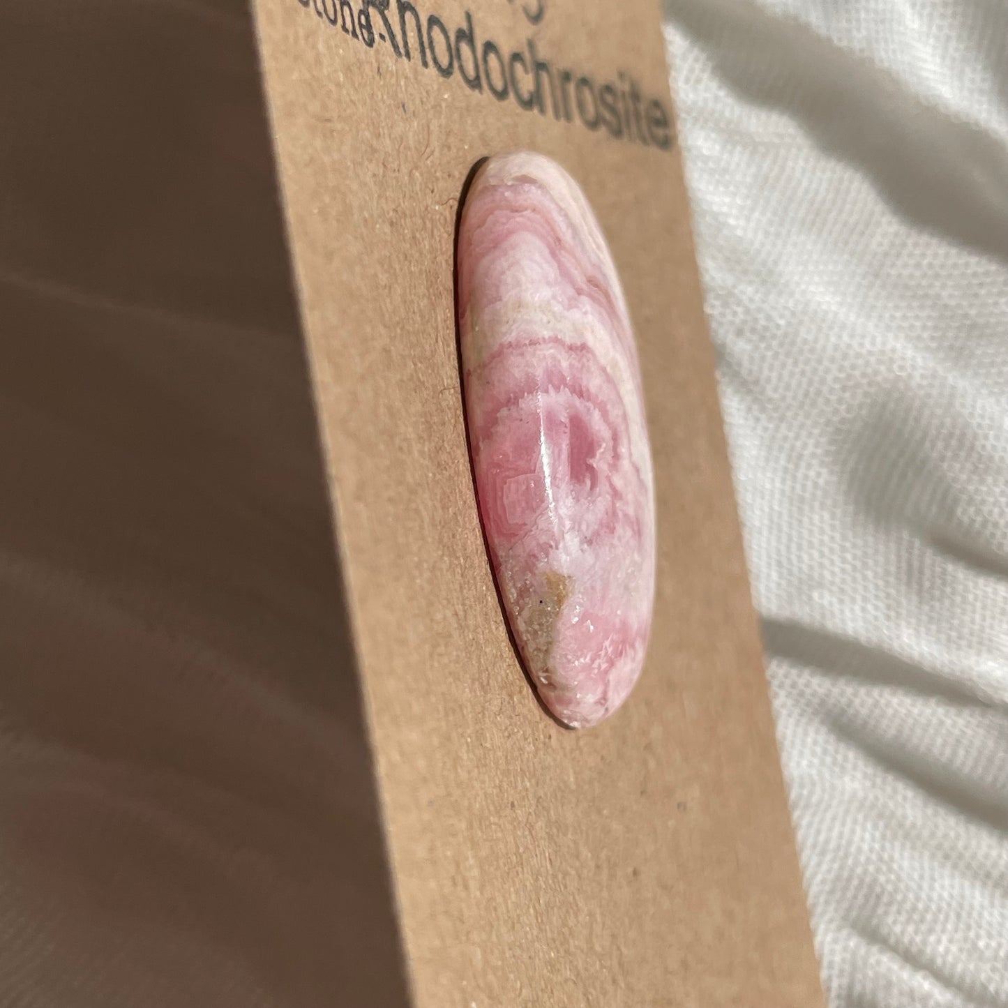 Rhodochrosite Cabochon - R037 5D4C93F4-0142-4EBB-B91A-18154CFFE717 Brandedandwild.com