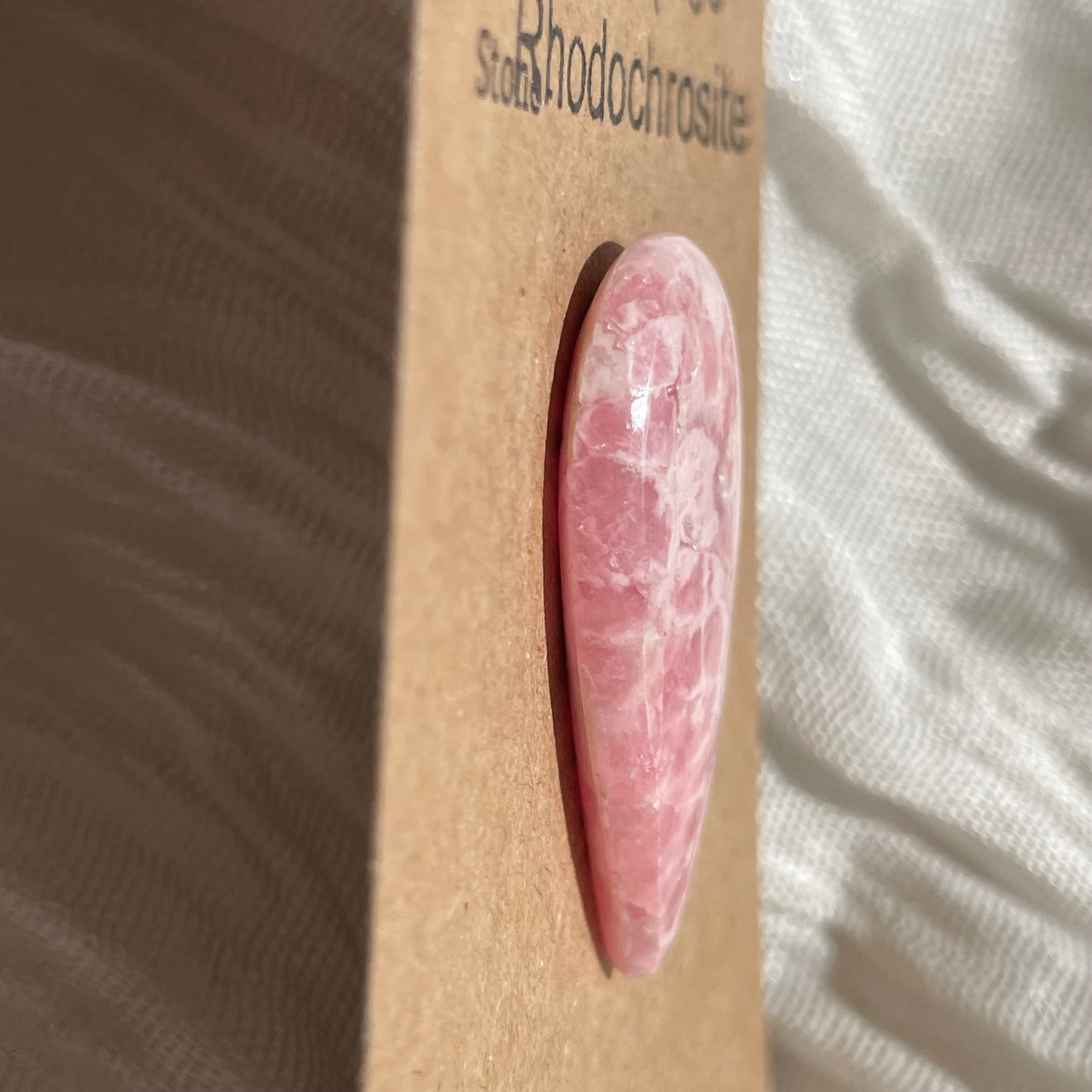 Rhodochrosite Cabochon - R055 BE23F7C8-9A30-4287-A2A7-F3DBA1F83770 Brandedandwild.com