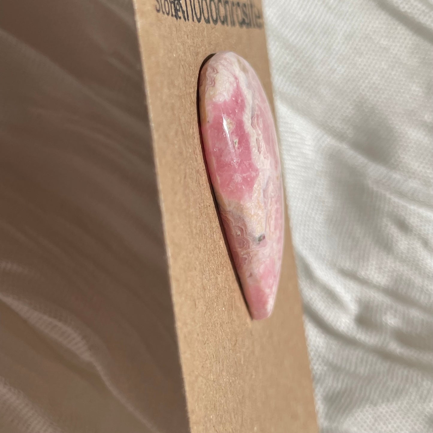 Rhodochrosite Cabochon - R058 D79B5866-3DE2-4894-8D23-37D4B0E2C234 Brandedandwild.com