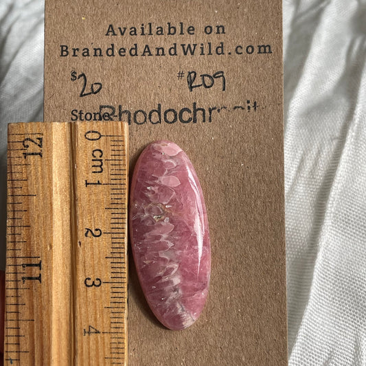 Rhodochrosite Cabochon - R09 028A2E68-C69B-4271-995C-9DCF020E4D17 Brandedandwild.com