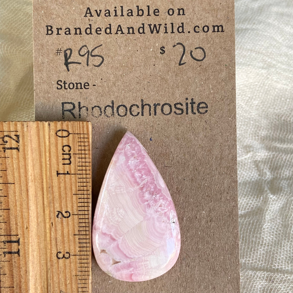Rhodochrosite Cabochon - R95 05263626-9466-43AA-8FF9-516B2EF44F29 Brandedandwild.com