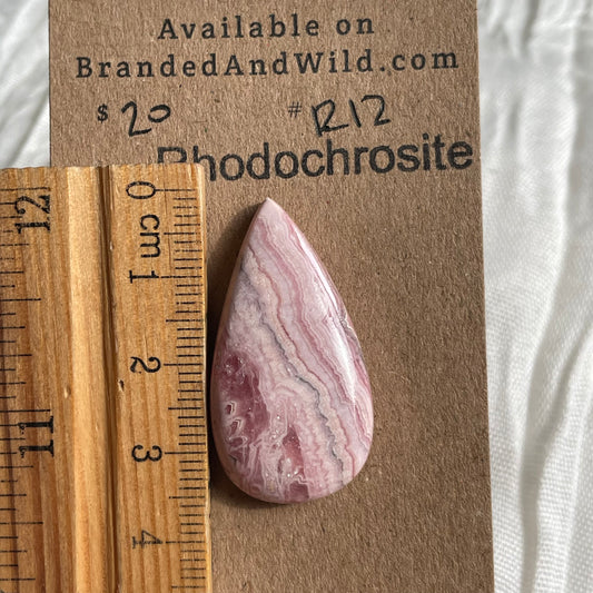 Rhodochrosite Cabochon - R12 0581420C-C6D8-4279-B13D-0C92D755E023 Brandedandwild.com