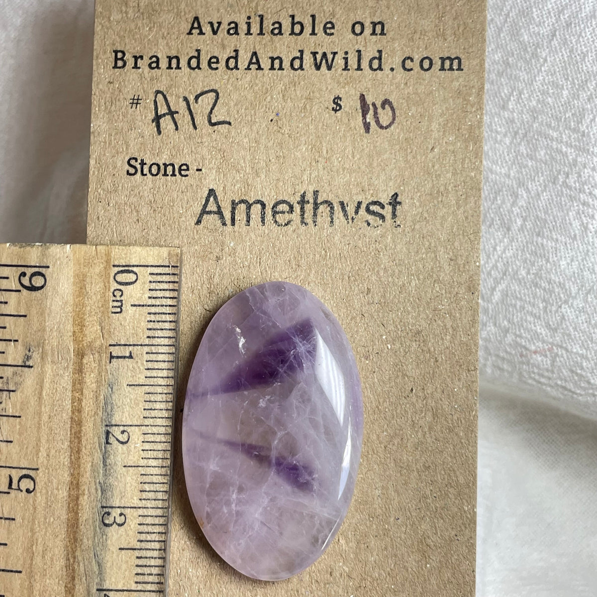 Amethyst Cabochon - A12 10E1F8AC-9B9F-4D37-BFD5-60B13CD3F33A Brandedandwild.com