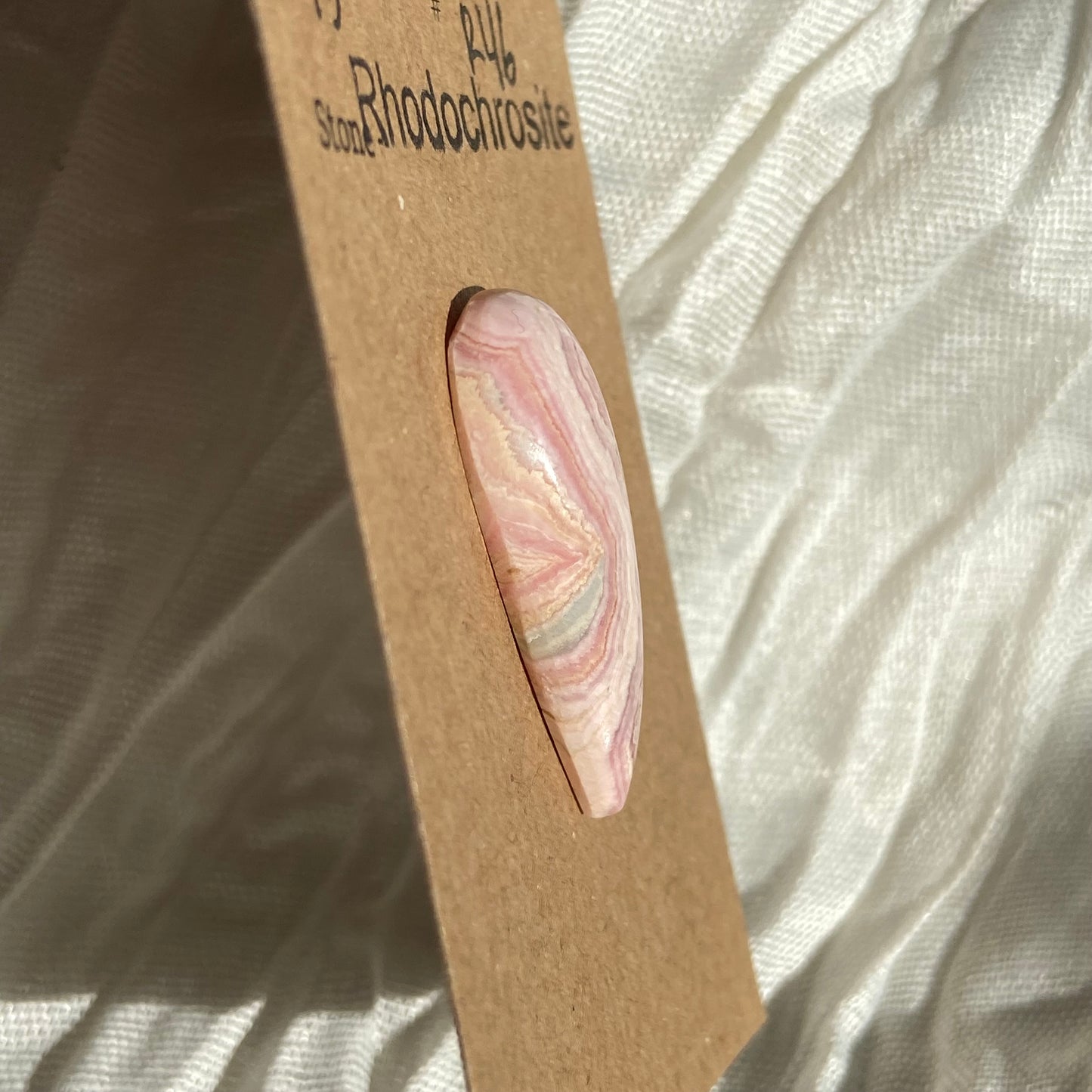 Rhodochrosite Cabochon - R46 128CD2FA-5BDF-4142-ACB0-29DEB19A37BF Brandedandwild.com