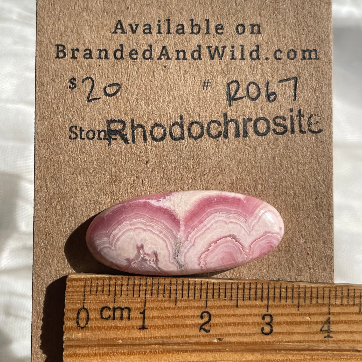 Rhodochrosite Cabochon - R067 1A81E3A6-84D6-4148-8795-362E4153D8B1 Brandedandwild.com
