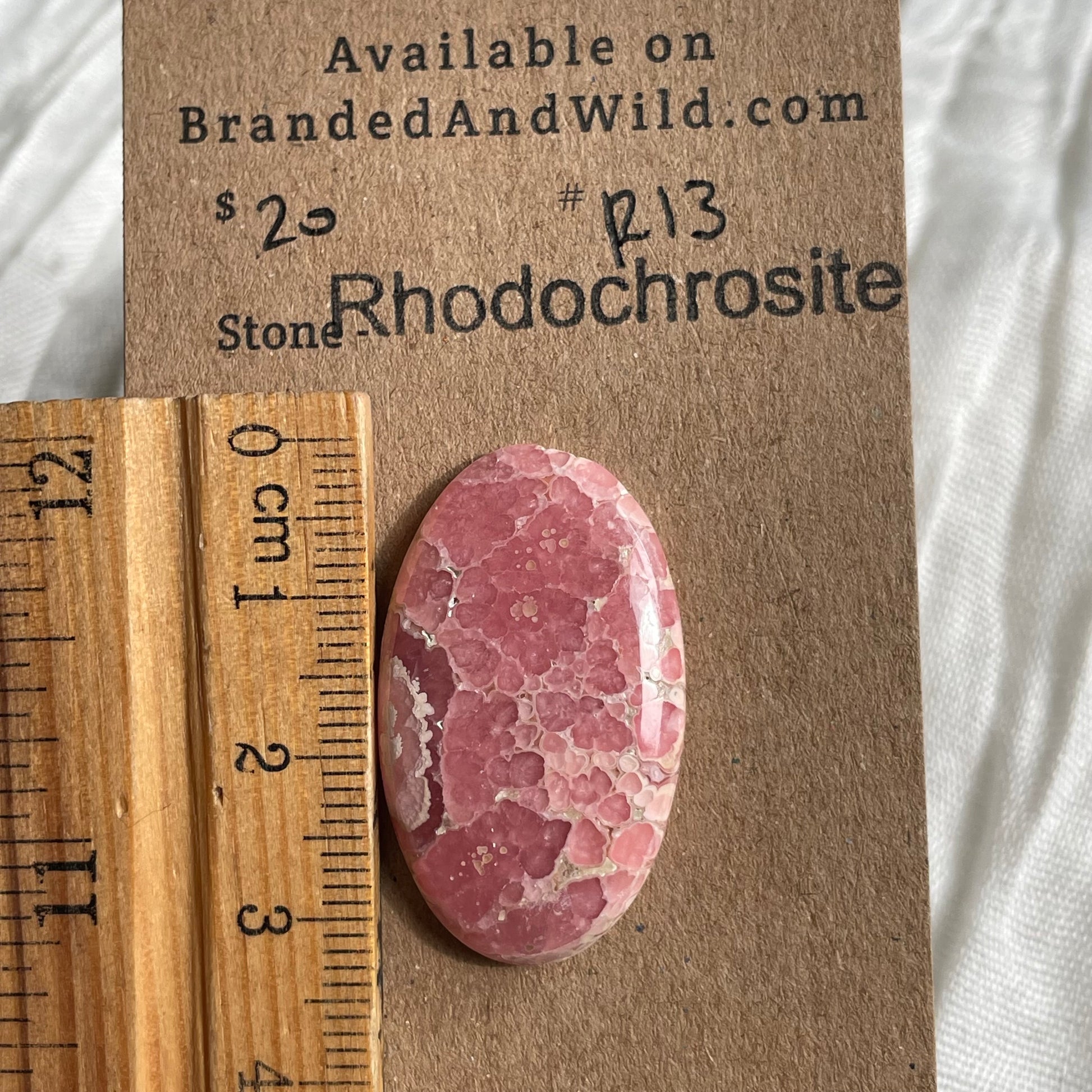 Rhodochrosite Cabochon - R13 25C23A9D-A578-4DFD-A0D9-2785D90B860E Brandedandwild.com