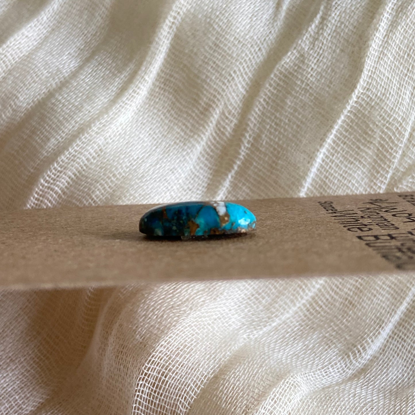 Kingman Turquoise, White Buffalo, Copper Cabochon - KW04