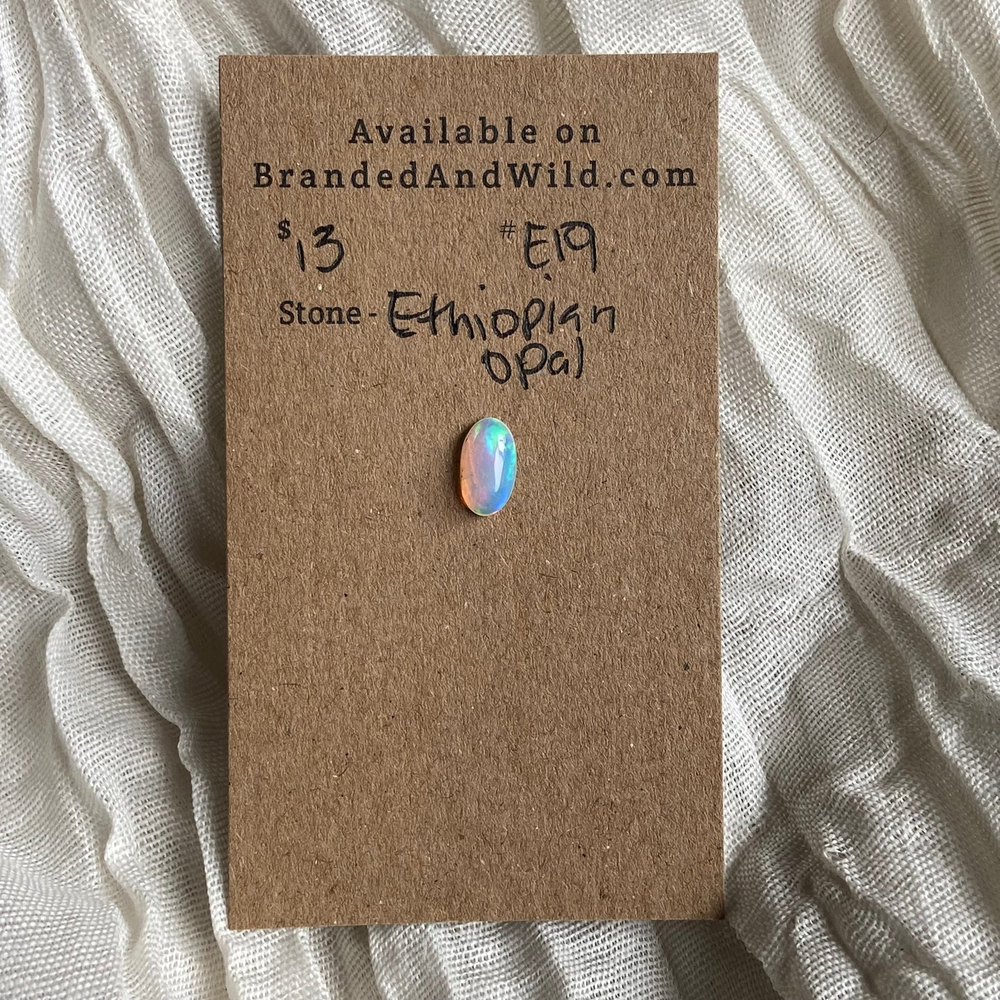 Ethiopian Opal Cabochon - E19 2735B65F-1D17-4FEB-930E-9D8295ABF8F0 Brandedandwild.com