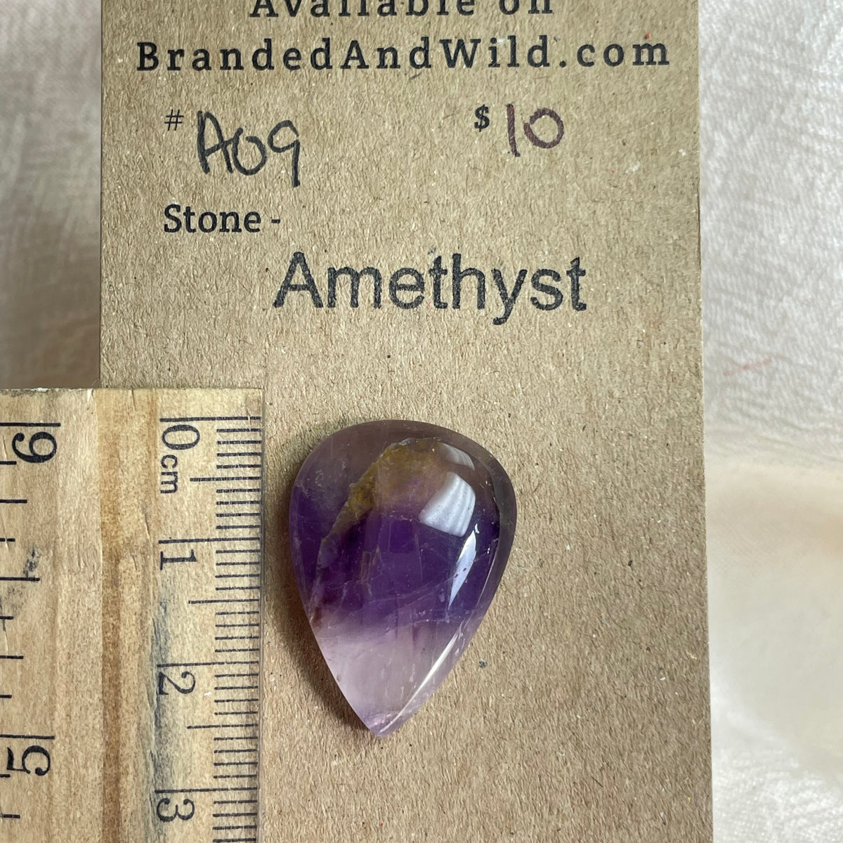 Amethyst Cabochon - A09 28D602F7-E59B-4B94-A47A-E1F83DA3B352 Brandedandwild.com