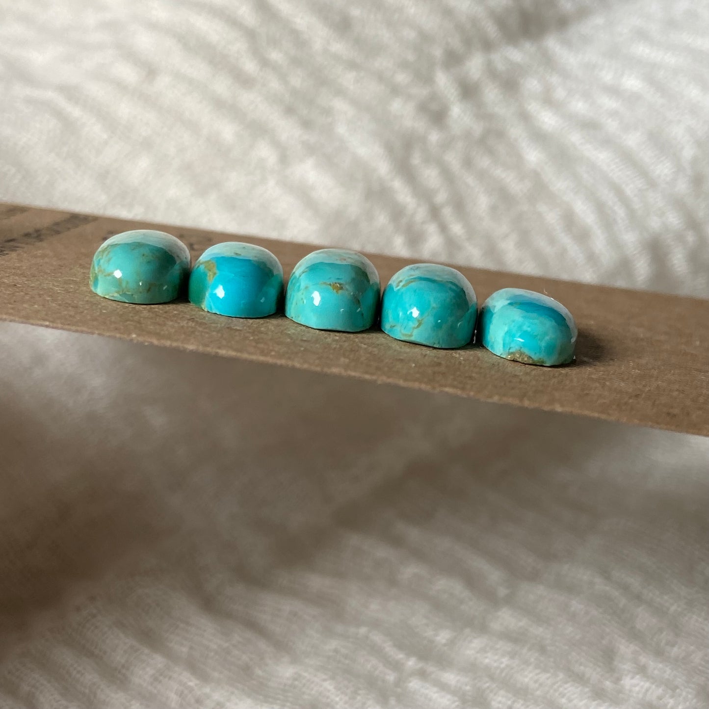 Kingman Turquoise Cabochon - KT10 29DE8601-6AB3-495D-92FA-1575C26C4191 Brandedandwild.com