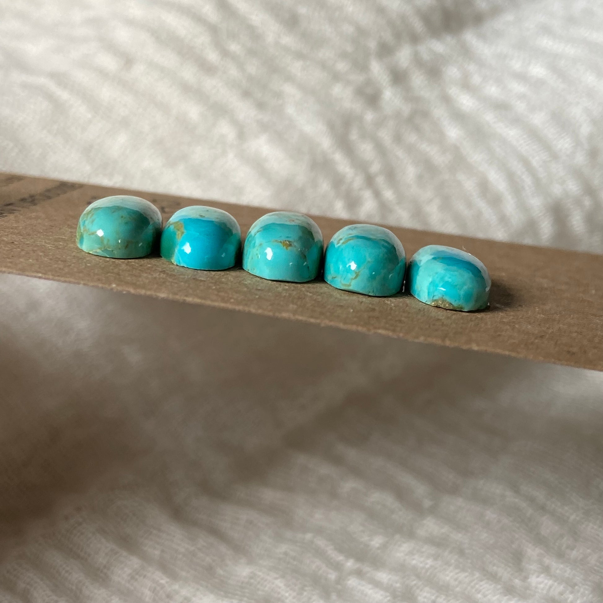 Kingman Turquoise Cabochon - KT10 29DE8601-6AB3-495D-92FA-1575C26C4191 Brandedandwild.com