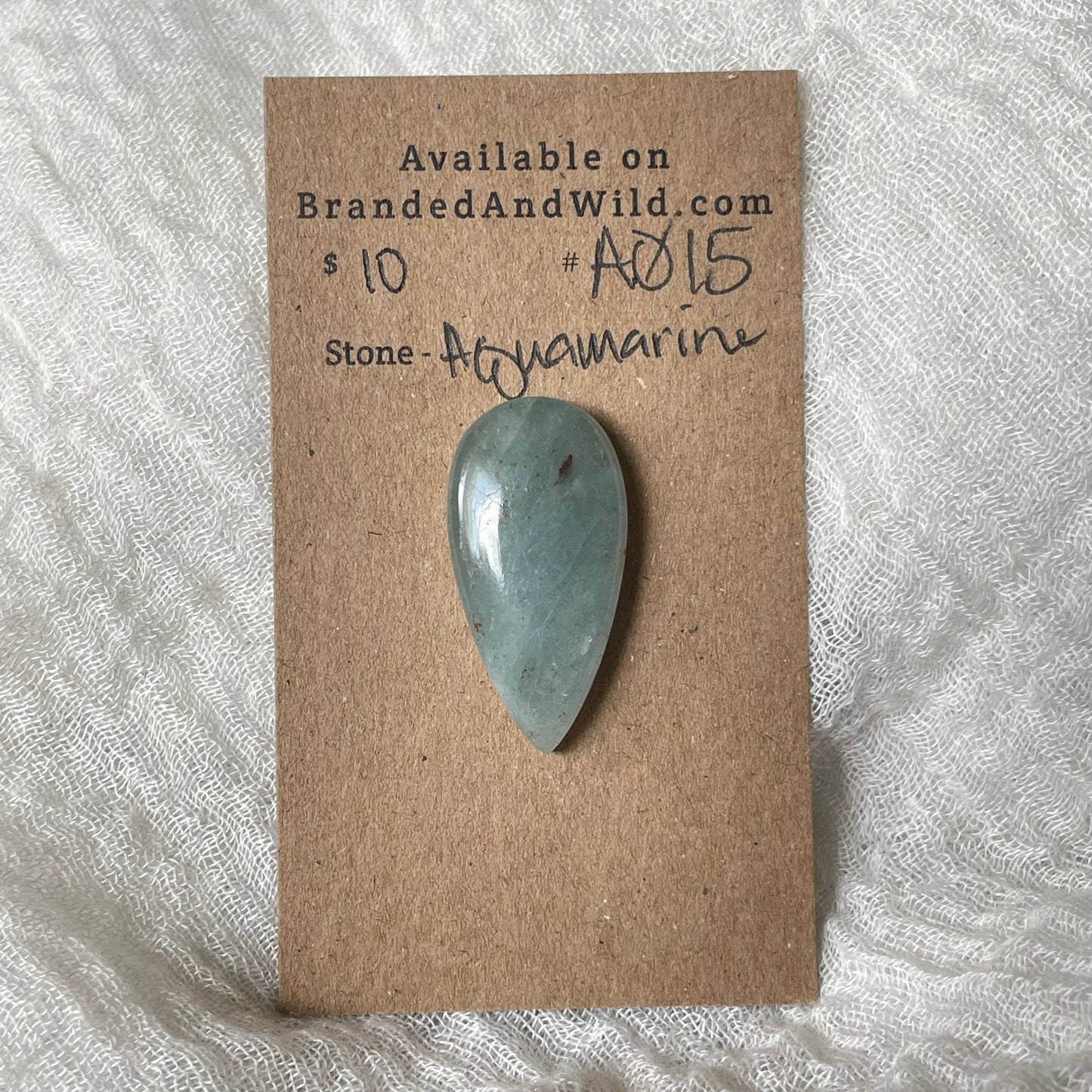 Aquamarine Cabochon AQ15 2D7A5967-6707-47AC-A448-7577F90AB9D3 Brandedandwild.com