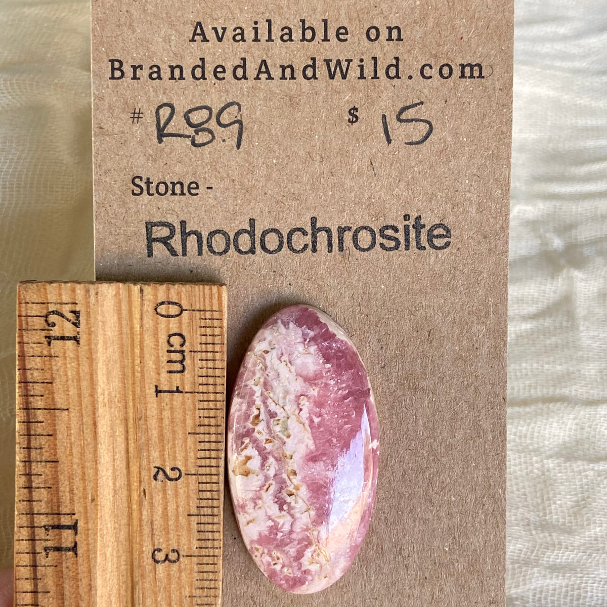 Rhodochrosite Cabochon - R89 2DE0B7C5-2380-4D68-AD88-F8C3C5EBF76B Brandedandwild.com