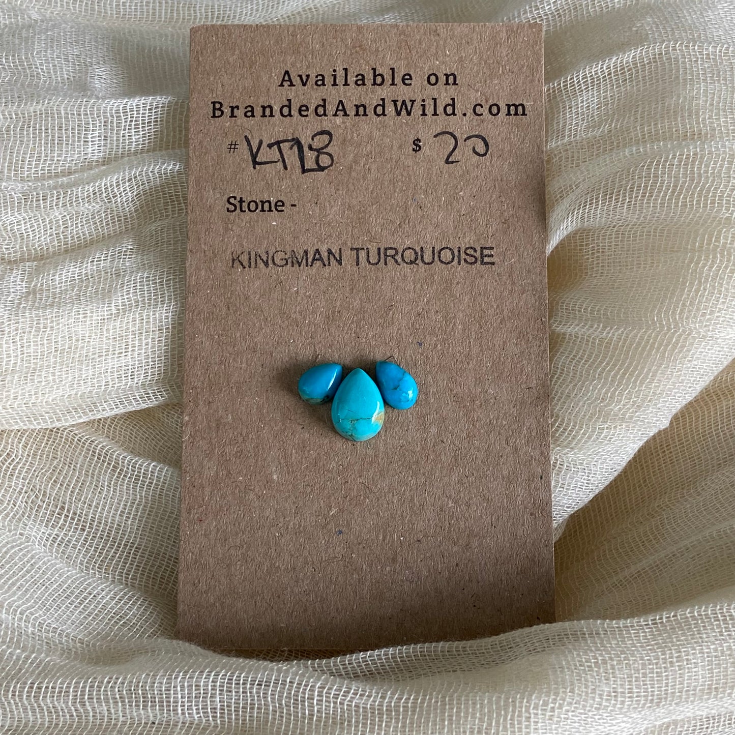 Kingman Turquoise Cabochon - KT28 2E03E8CB-3D90-4502-AD70-551361C25747 Brandedandwild.com