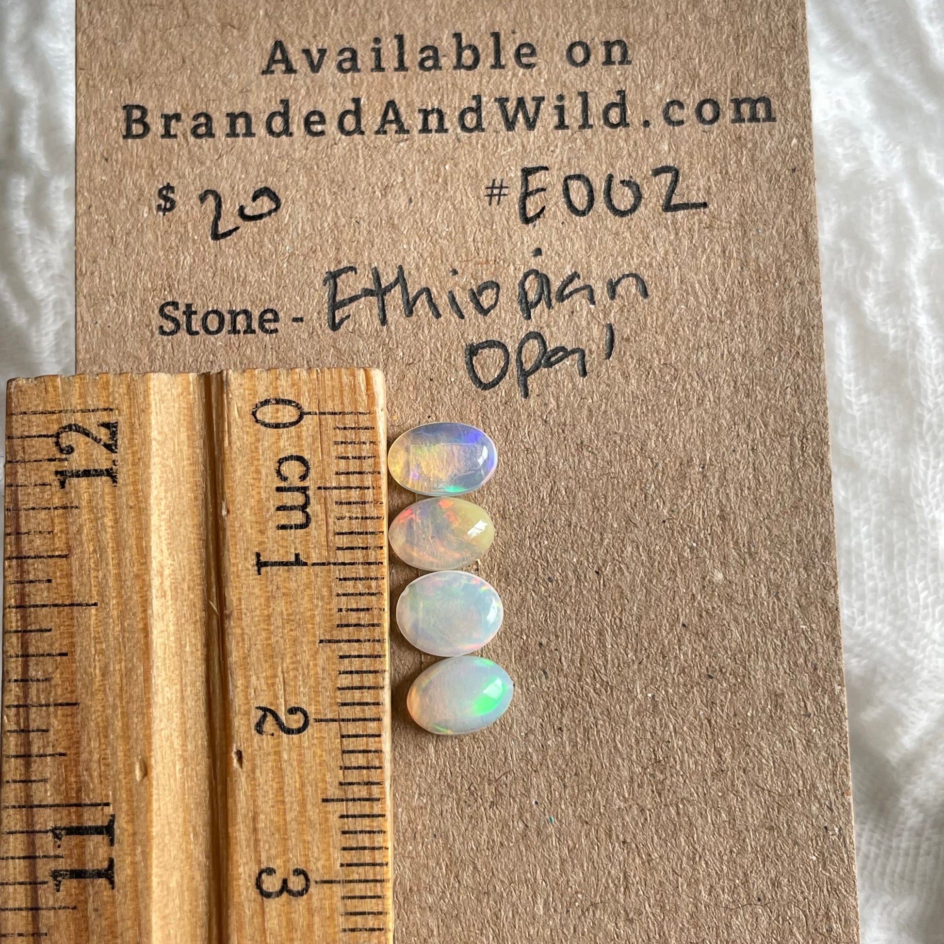 Ethiopian Opal Cabochon - E002 2E8CFF7C-199D-4B4A-A1CB-16FEA0AFB207 Brandedandwild.com