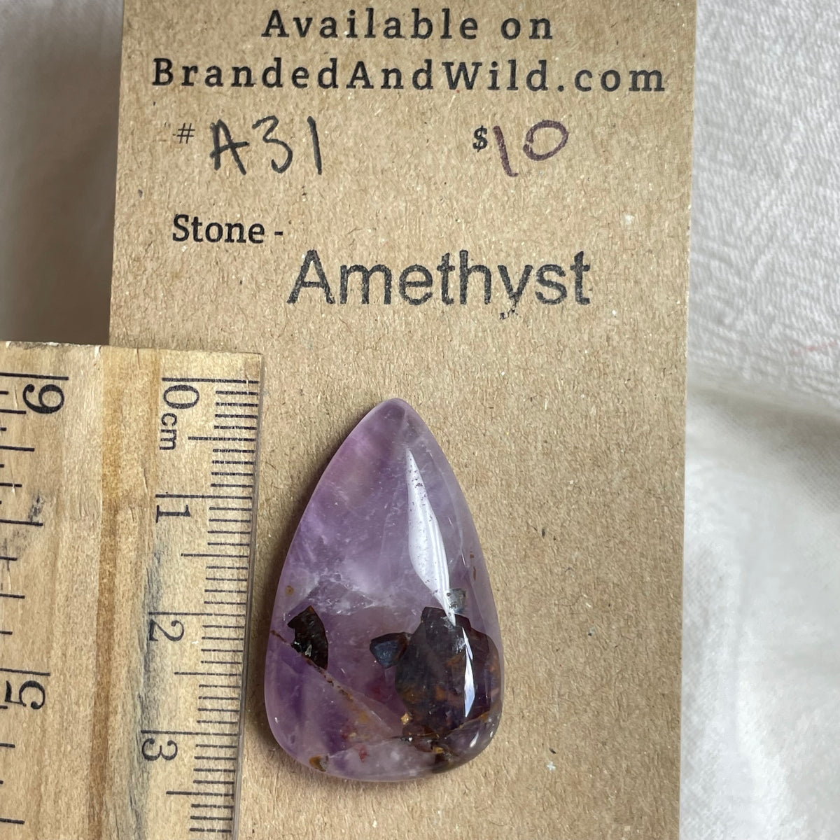 Amethyst Cabochon - A31 3D08B576-1FFE-4731-BCB5-D3027890A6BA Brandedandwild.com