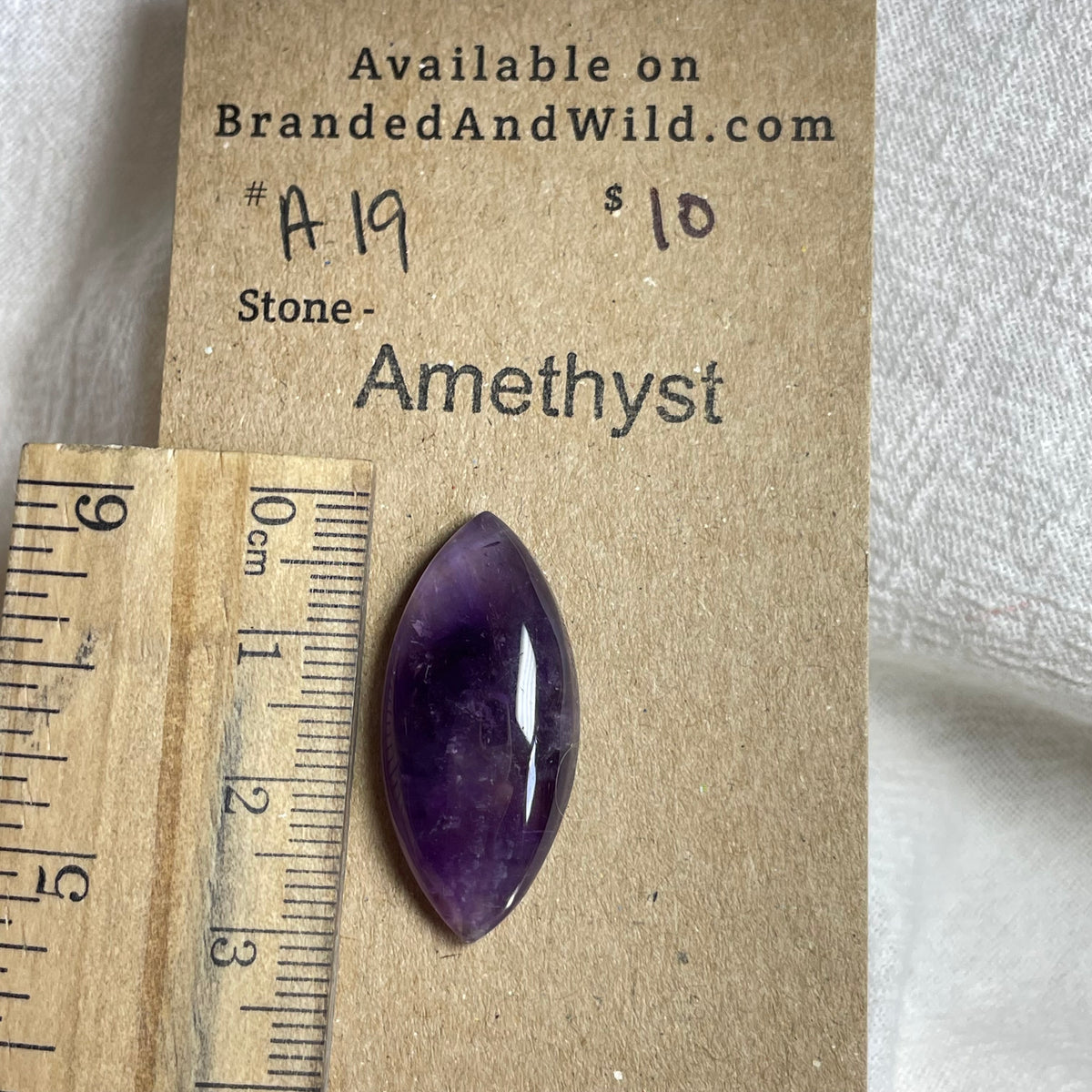 Amethyst Cabochon - A19 3D516507-6B09-451D-8DF5-C6B1042412BF Brandedandwild.com