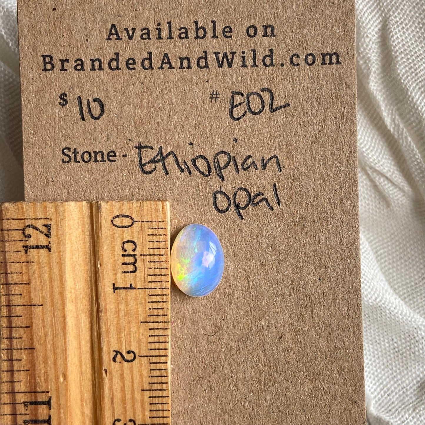 Ethiopian Opal Cabochon - EO2 423DE523-5647-4842-A93A-A2E073A7B7DC Brandedandwild.com