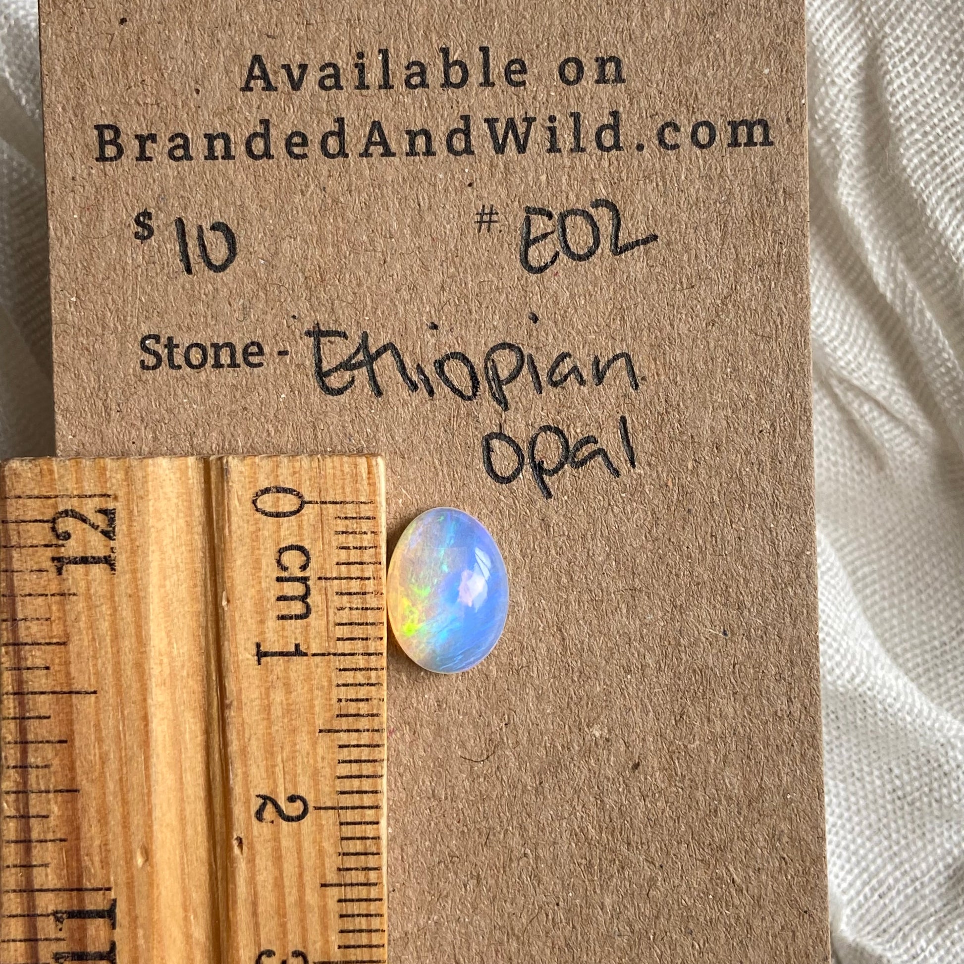 Ethiopian Opal Cabochon - EO2 423DE523-5647-4842-A93A-A2E073A7B7DC Brandedandwild.com