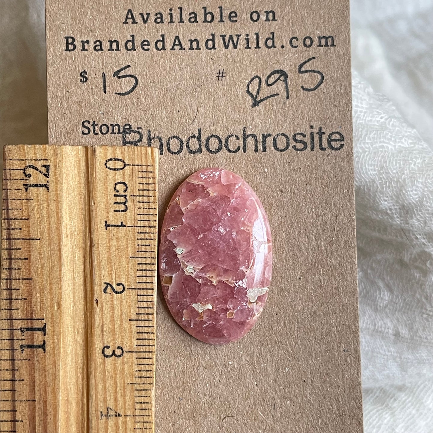 Rhodochrosite Cabochon - R95 434C20A4-8CAA-4AC8-A229-CBAC8908ACAF Brandedandwild.com