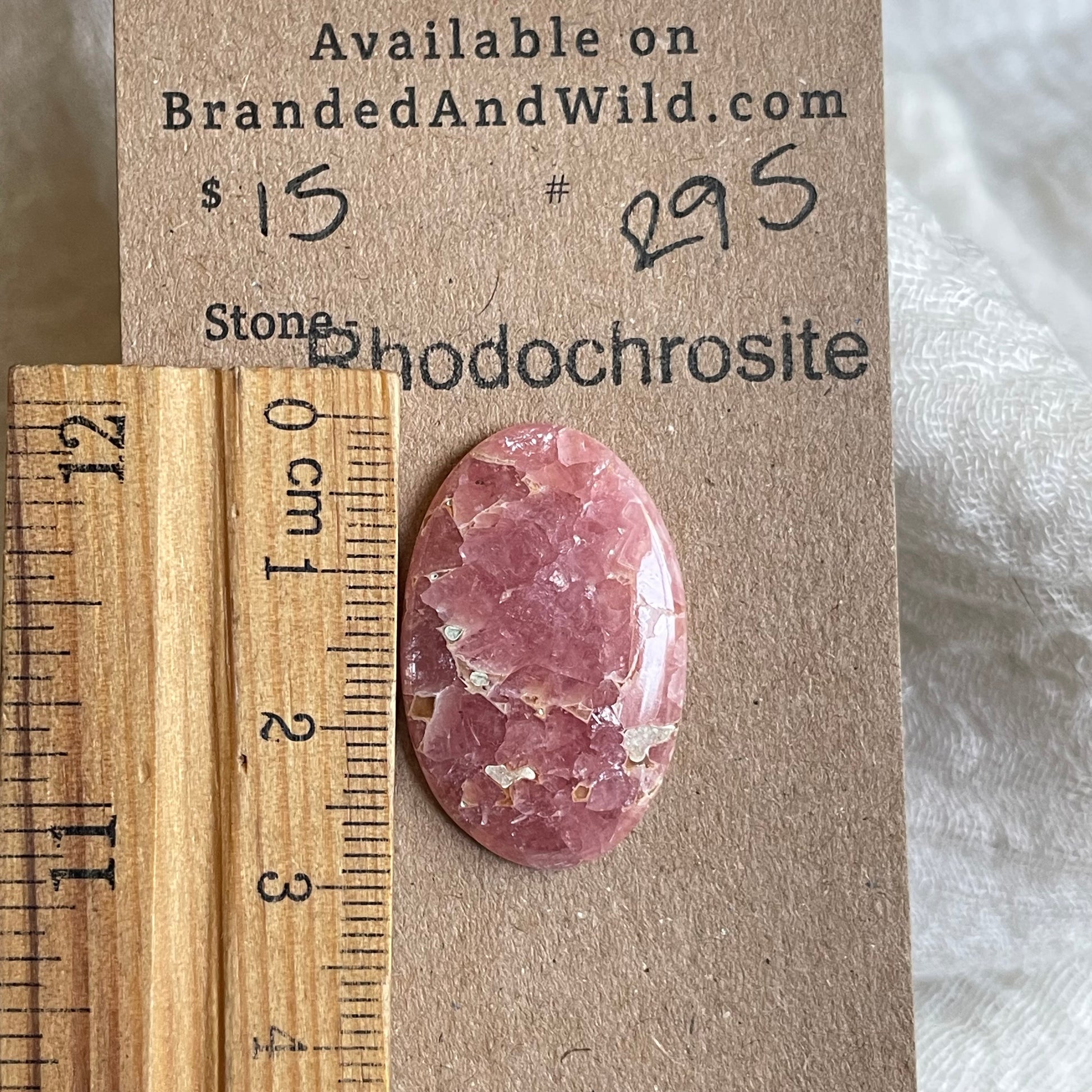 Rhodochrosite Cabochon - R95 434C20A4-8CAA-4AC8-A229-CBAC8908ACAF Brandedandwild.com
