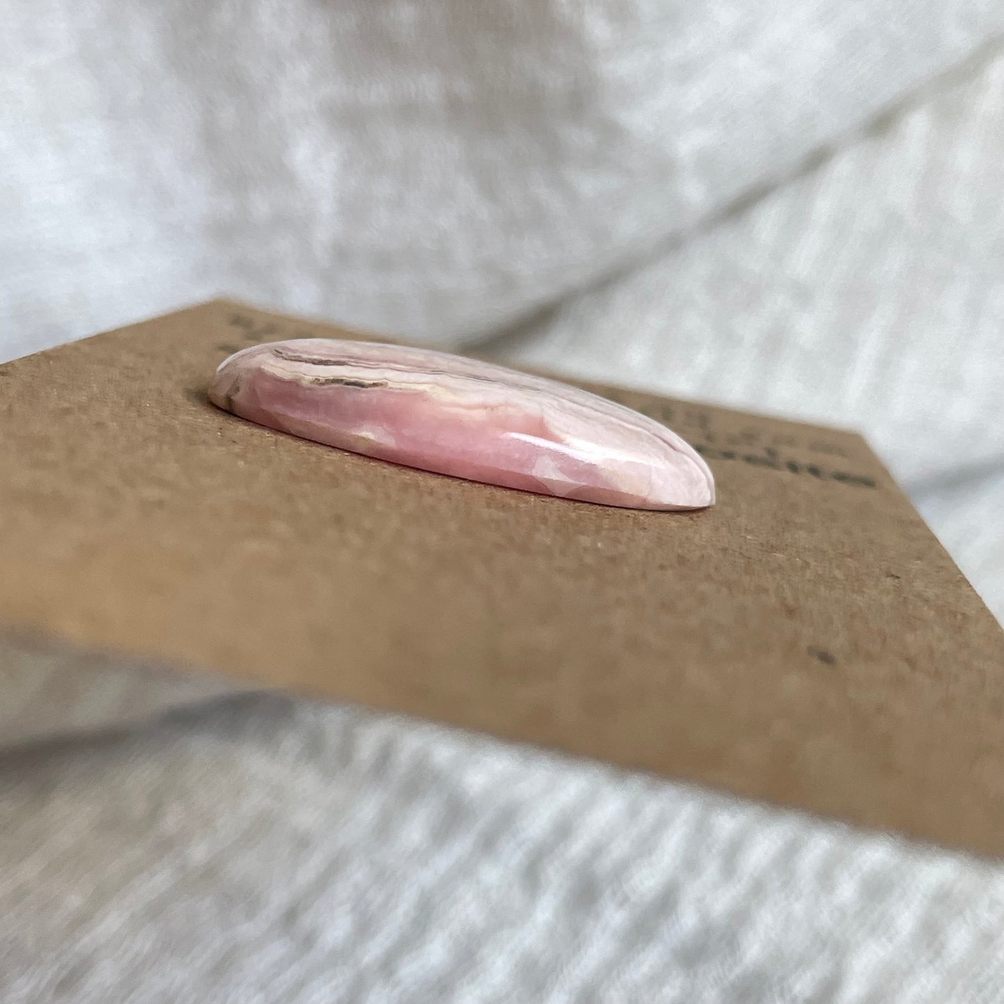 Rhodochrosite Cabochon - R79 48DFF056-ACC0-46C8-BD56-EA5B01CD08D3 Brandedandwild.com