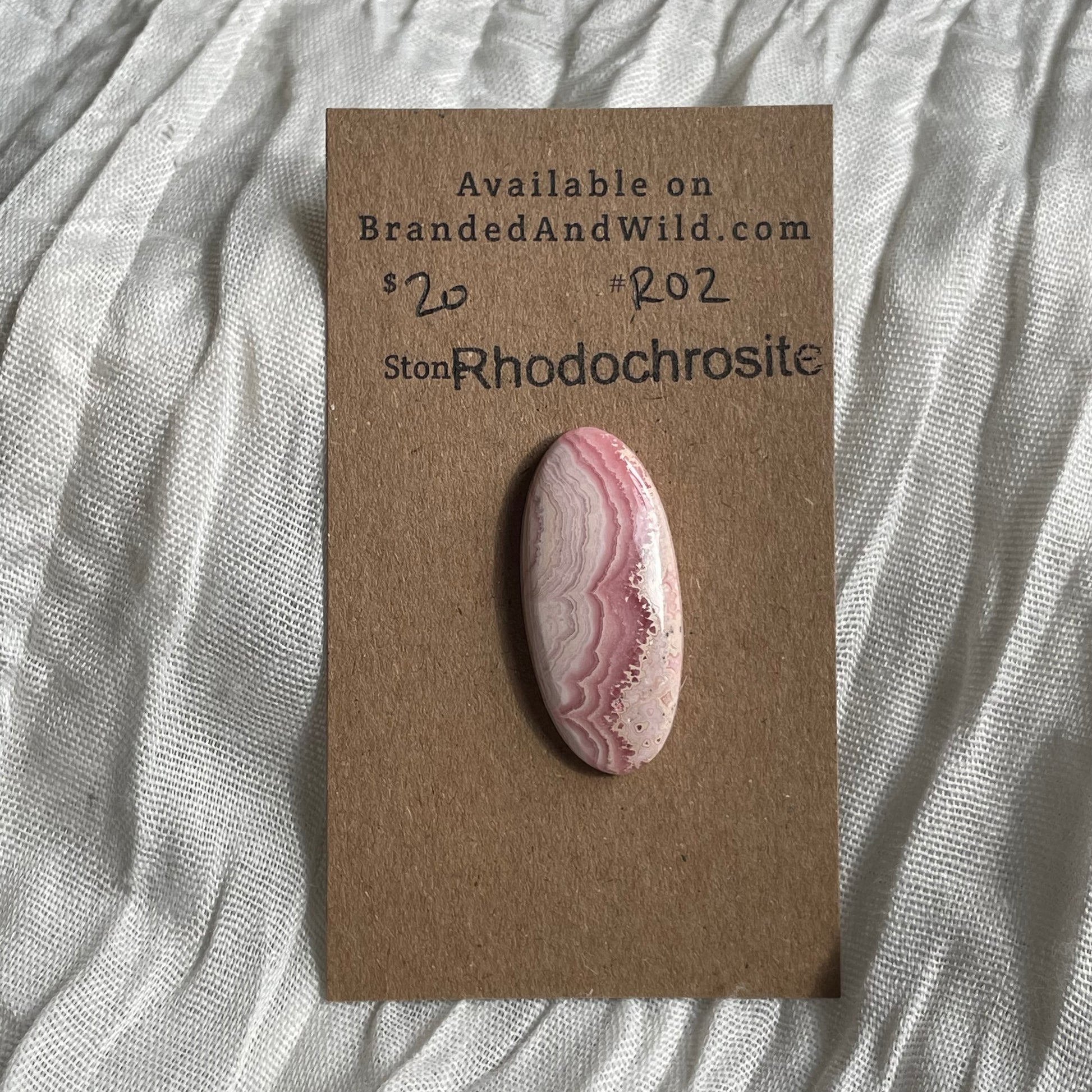 Rhodochrosite Cabochon - R02 4B94E31C-E323-4E8D-AAF0-31B95A378FC8 Brandedandwild.com