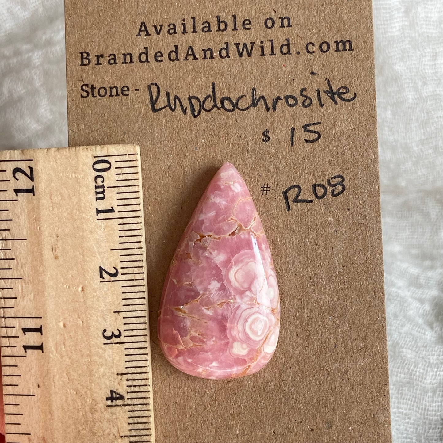 Rhodochrosite Cabochon - R08 5AE455DF-2EB1-4138-84DF-911ECC899A97 Brandedandwild.com