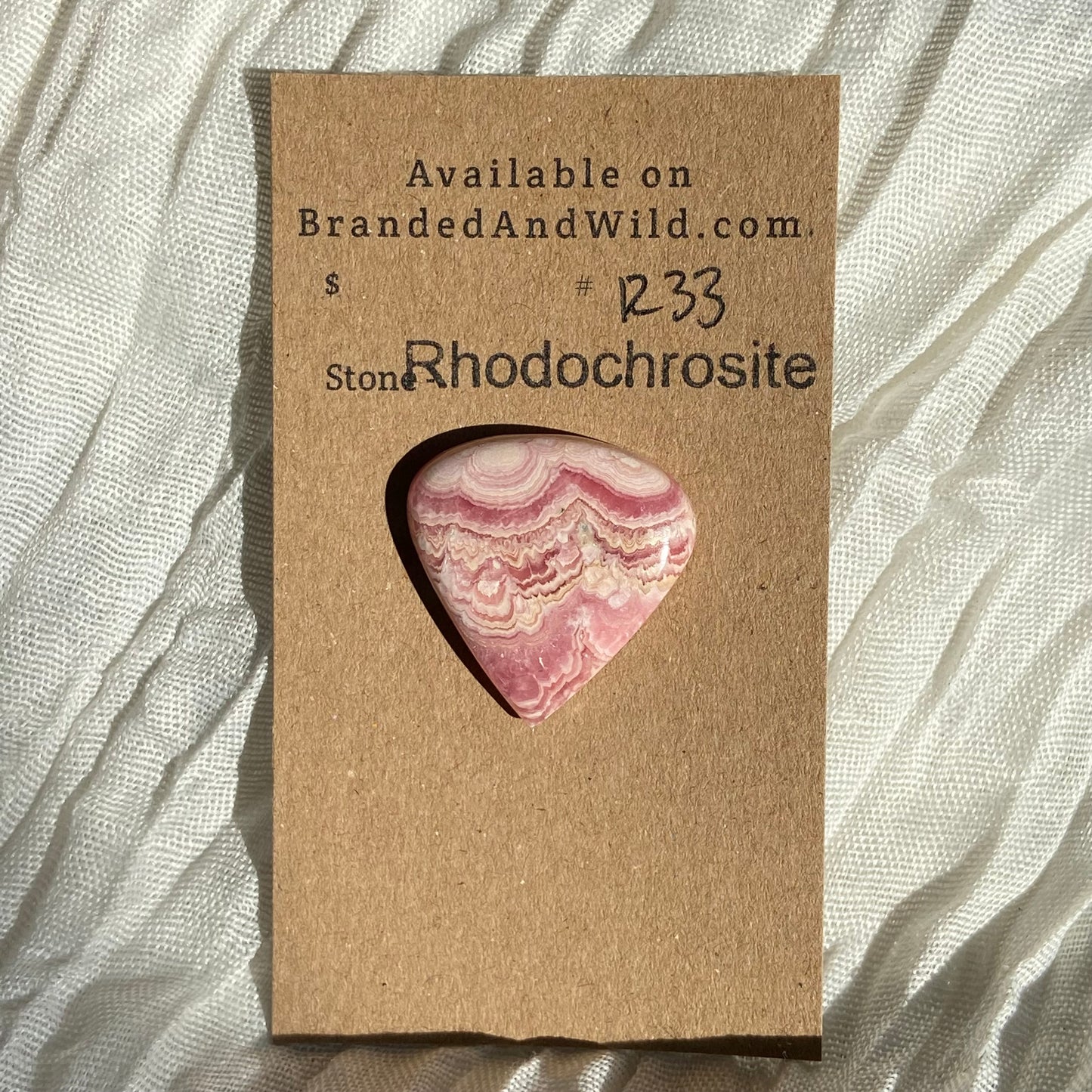 Rhodochrosite Cabochon - R33 5AF3E3F2-BDD1-4362-9EDC-FCF0D616221C Brandedandwild.com