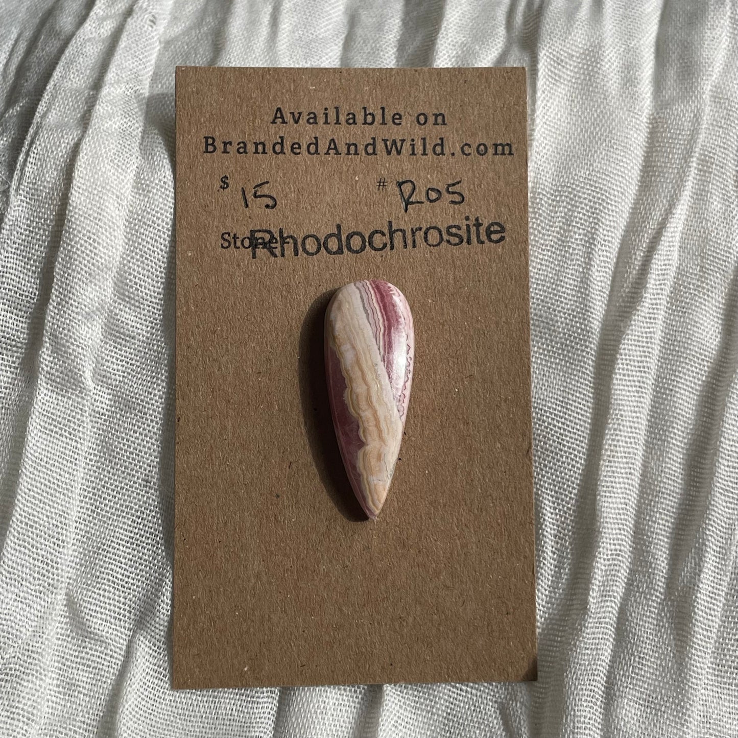 Rhodochrosite Cabochon - R05 5D851F12-80D6-4673-A62C-149524DA1D0A Brandedandwild.com
