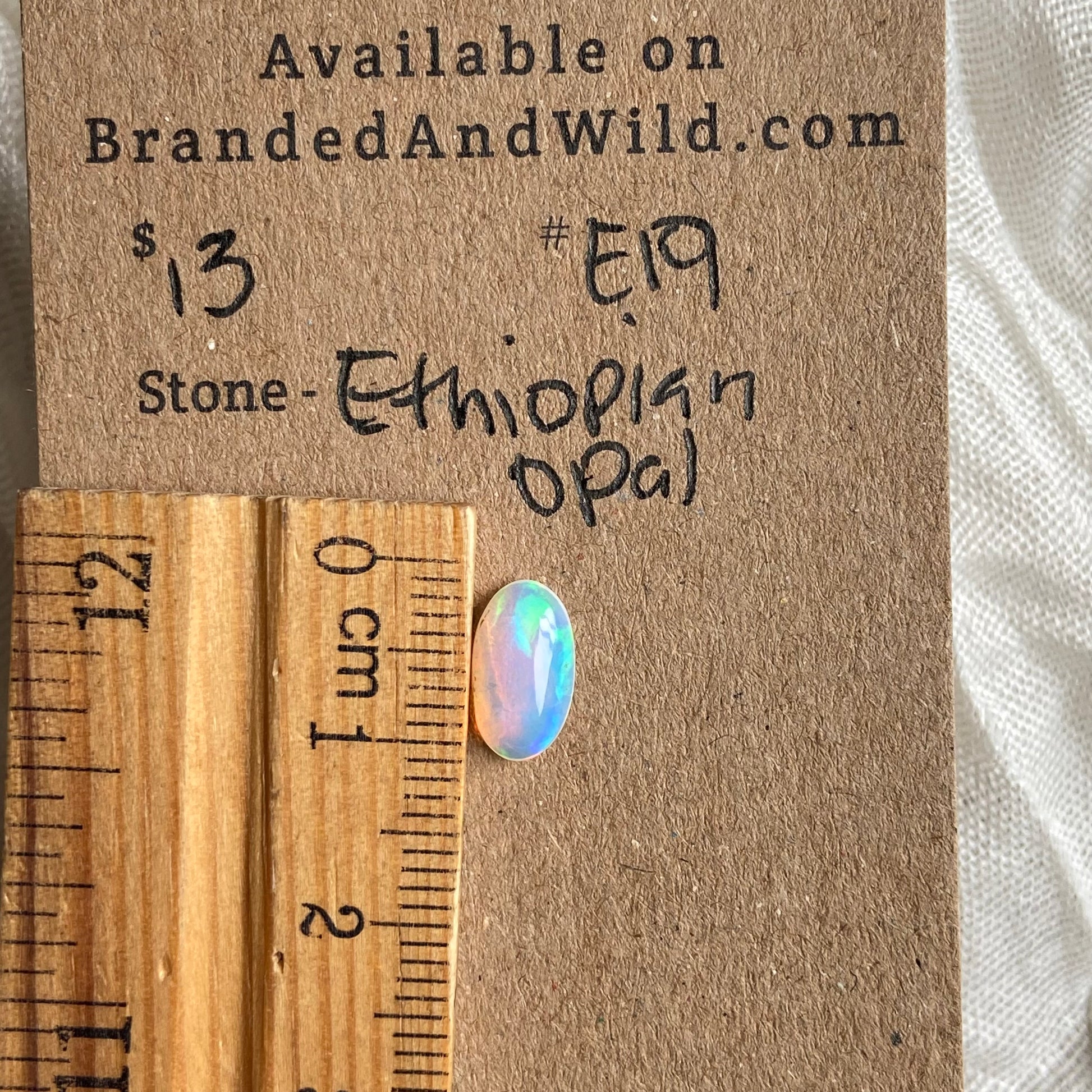 Ethiopian Opal Cabochon - E19 634FFA26-A7B8-4B92-A798-EC454D910D89 Brandedandwild.com