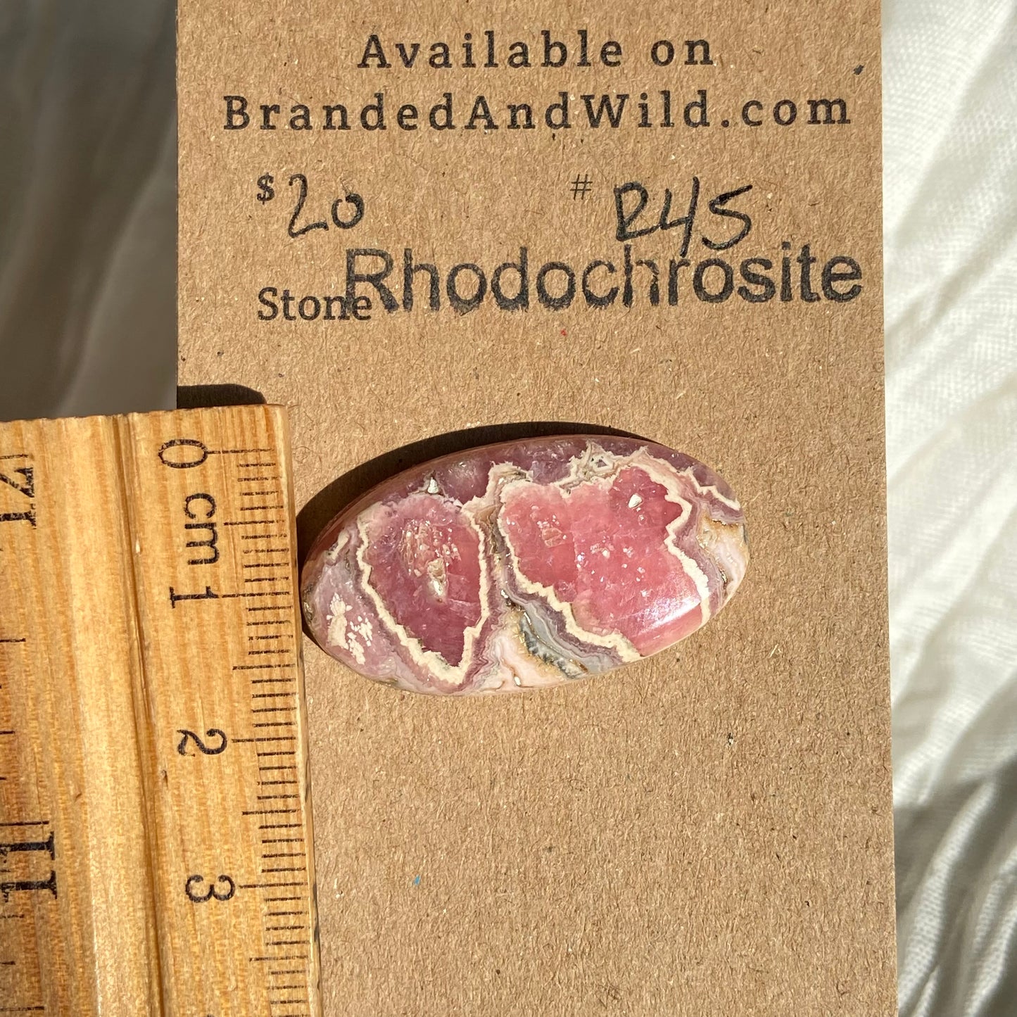 Rhodochrosite Cabochon - R45 65301F42-E11A-4BA7-9A46-3BFAABA842AD Brandedandwild.com
