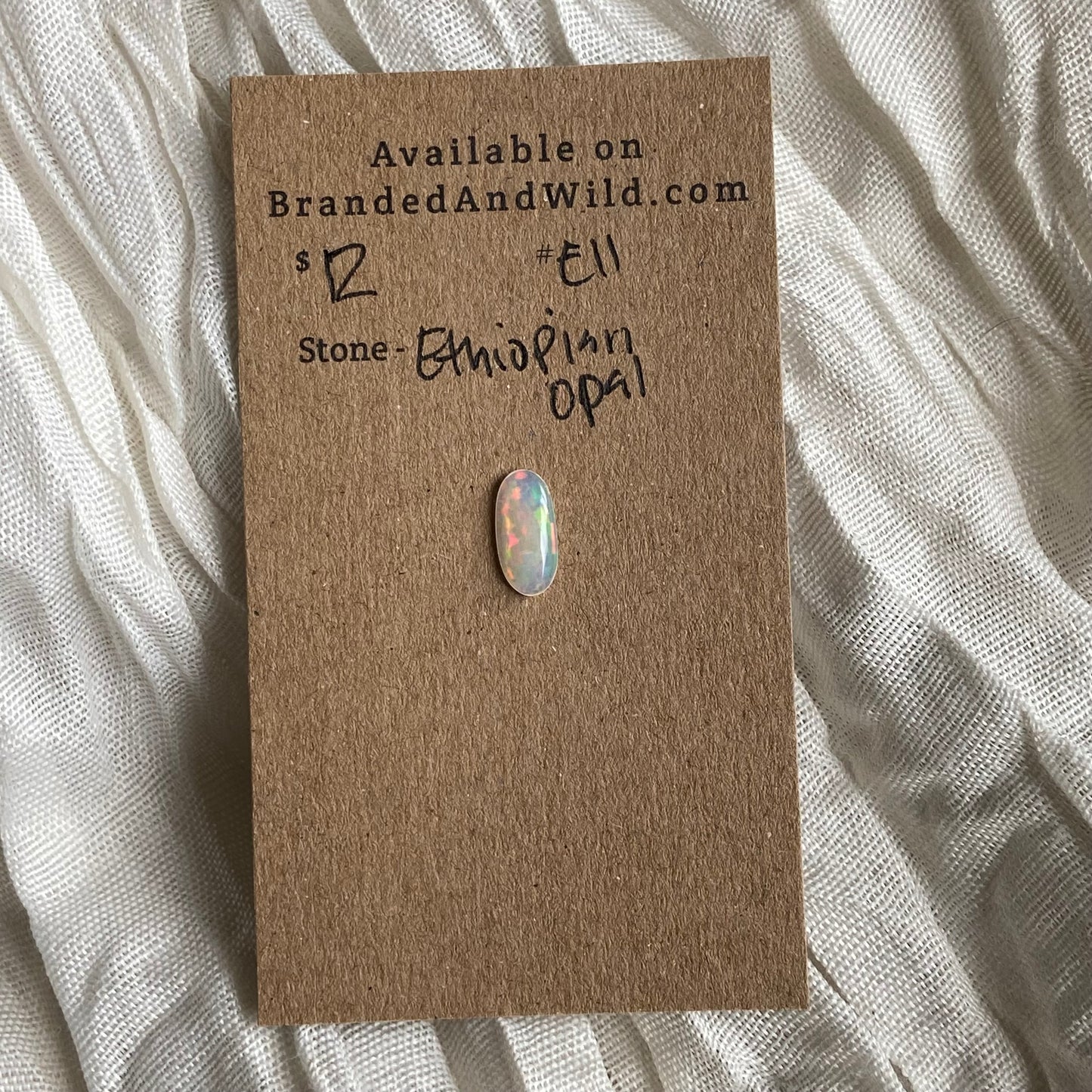 Ethiopian Opal Cabochon - E11 65FA234D-CFDE-4A38-8665-629868DE658E Brandedandwild.com