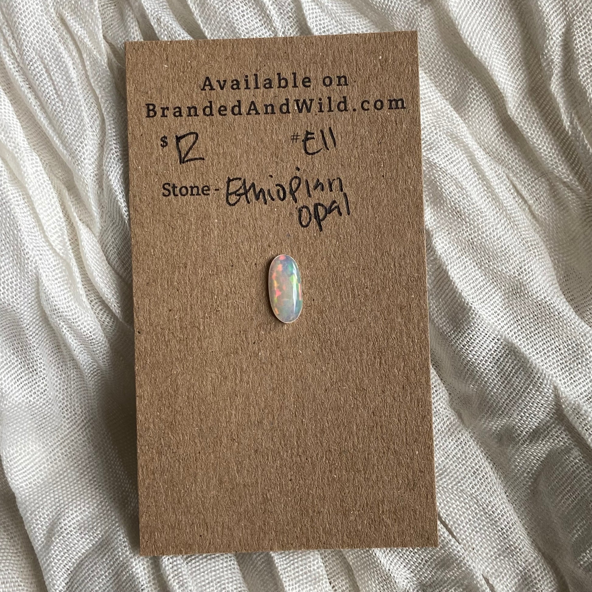Ethiopian Opal Cabochon - E11 65FA234D-CFDE-4A38-8665-629868DE658E Brandedandwild.com