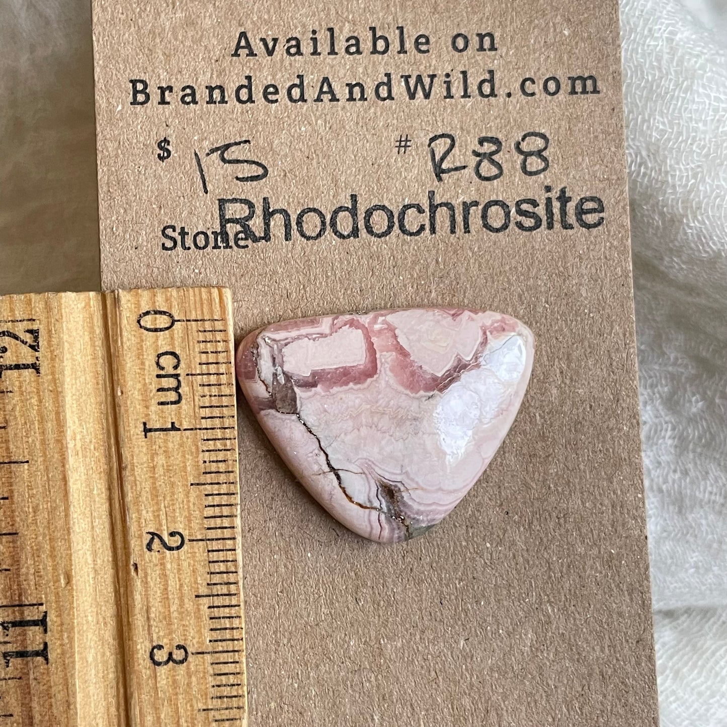 Rhodochrosite Cabochon - R88 6A382B5D-474F-472D-866C-E1FFF374369F Brandedandwild.com