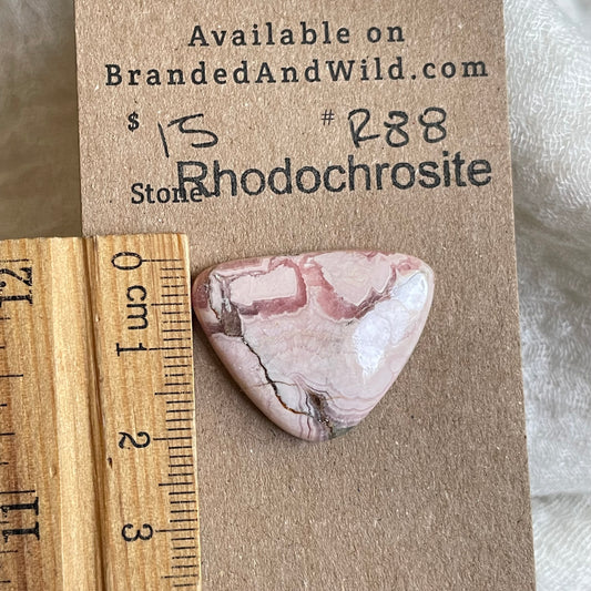 Rhodochrosite Cabochon - R88 6A382B5D-474F-472D-866C-E1FFF374369F Brandedandwild.com