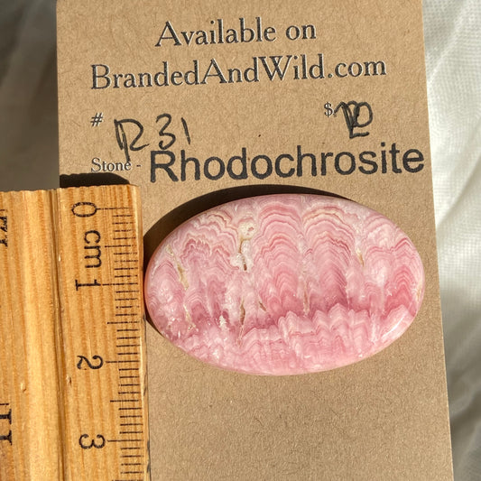 Rhodochrosite Cabochon - R31 6AACA530-C292-423B-9D0E-F6D65AC60A6B Brandedandwild.com