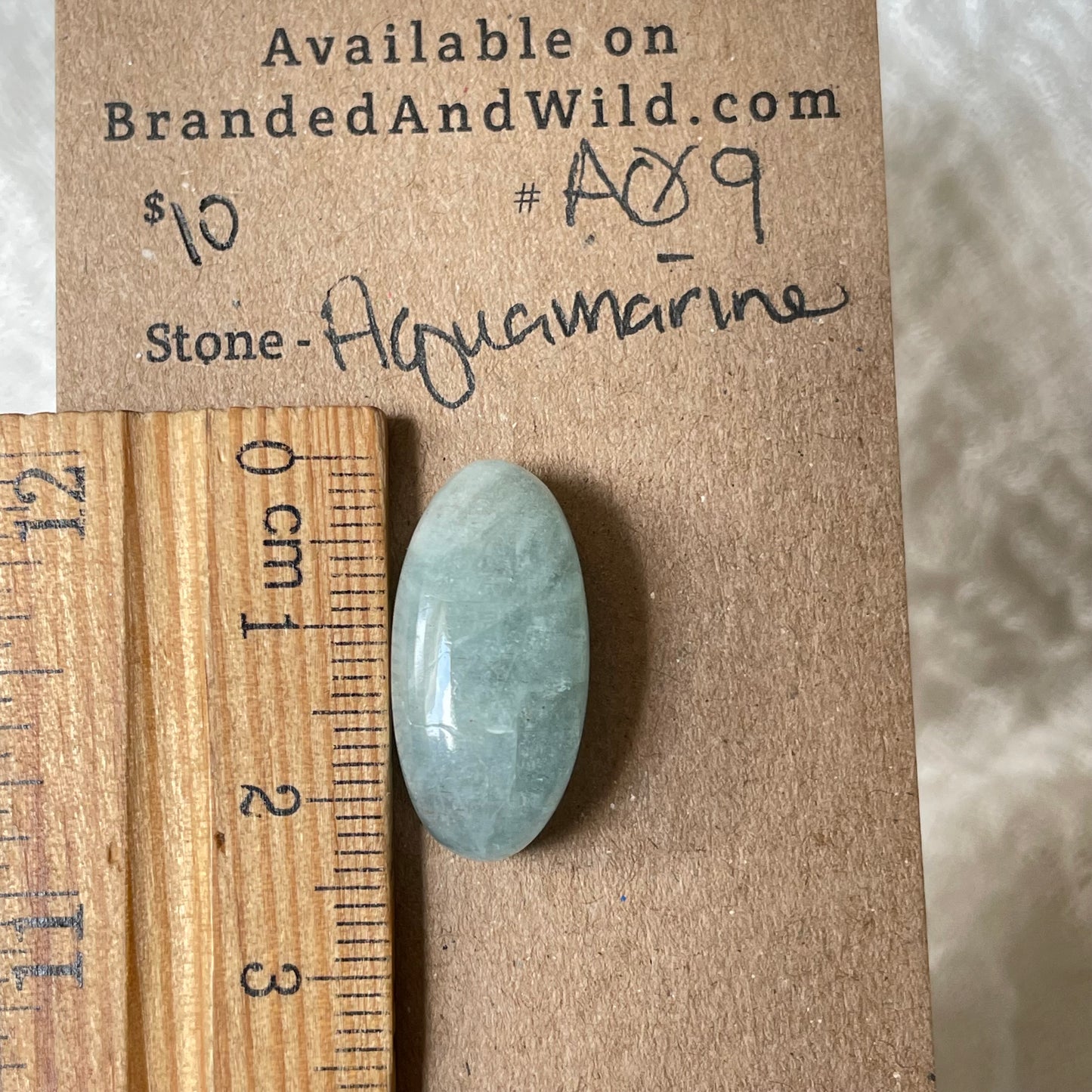 Aquamarine Cabochon AQ9 6AB42E3C-2626-445C-AFDC-2ECF314AE935 Brandedandwild.com