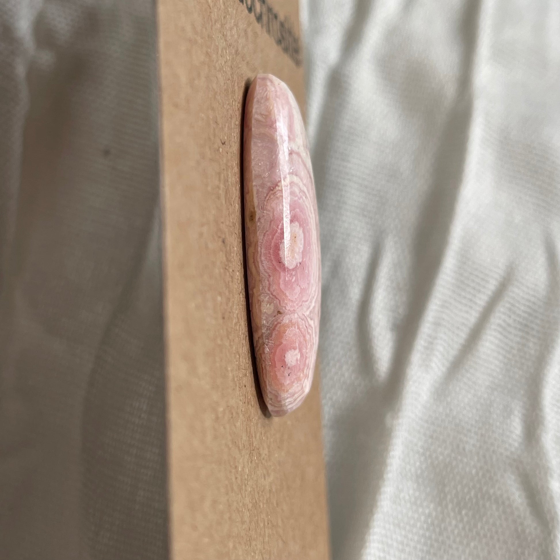 Rhodochrosite Cabochon - R18 72D4E880-75C4-4E20-B50C-87FF560D303A Brandedandwild.com