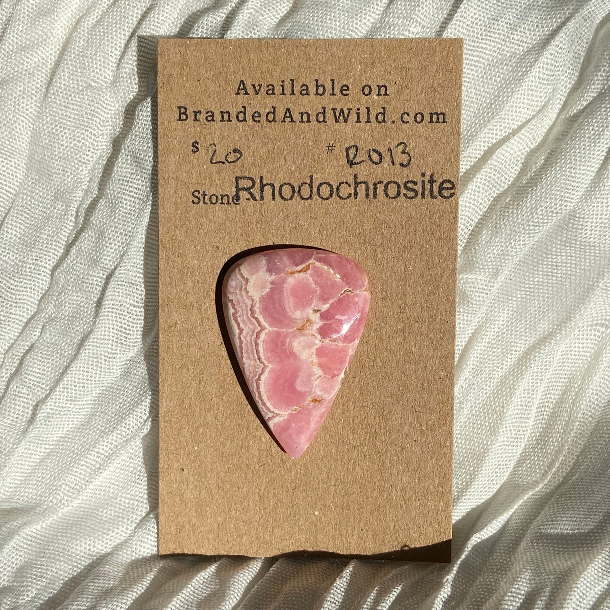 Rhodochrosite Cabochon - R13 781AEA18-3ED6-4DE3-AF30-F8712A0DC74E Brandedandwild.com