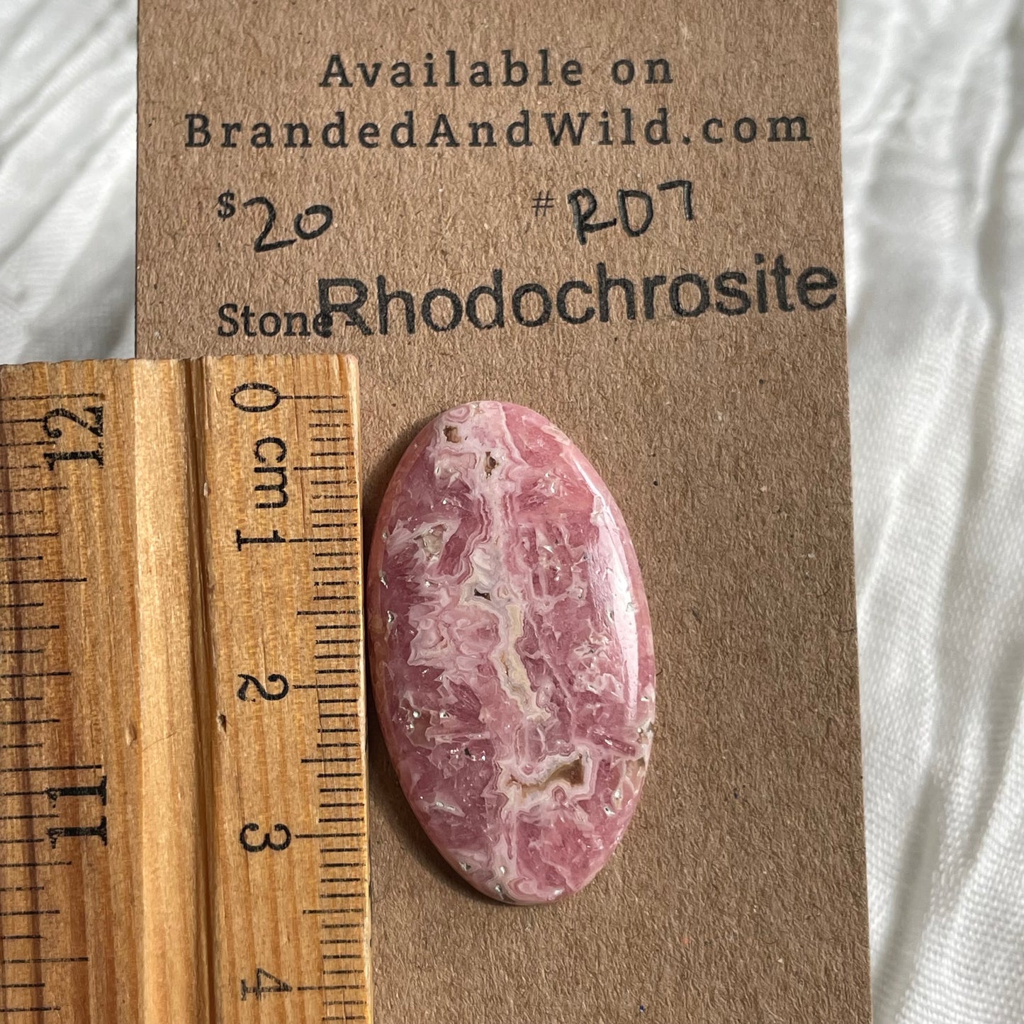Rhodochrosite Cabochon - R07 7D240F68-A9C7-4FF4-9BC6-0C9D17A67B34 Brandedandwild.com