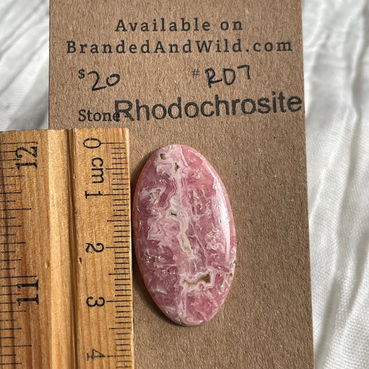 Rhodochrosite Cabochon - R07 7D240F68-A9C7-4FF4-9BC6-0C9D17A67B34 Brandedandwild.com
