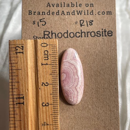 Rhodochrosite Cabochon - R18 7D4A7B2F-80BB-4AE1-8845-69B625BE70AC Brandedandwild.com