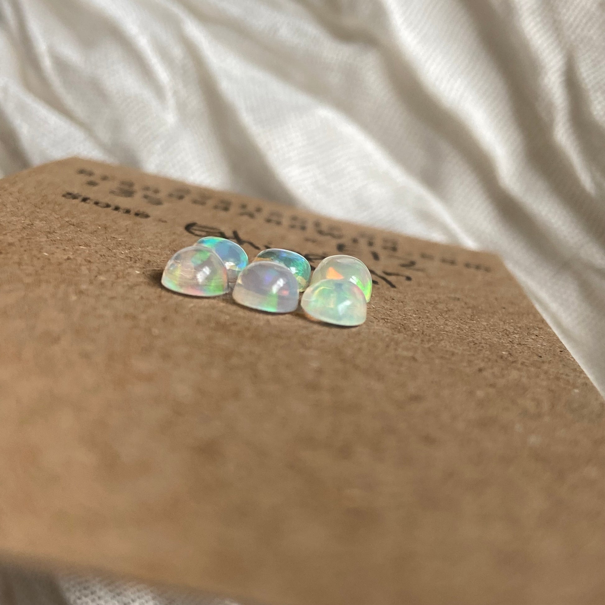 Ethiopian Opal Cabochon - E12 8324D71B-2540-4918-8032-71AF04532606 Brandedandwild.com