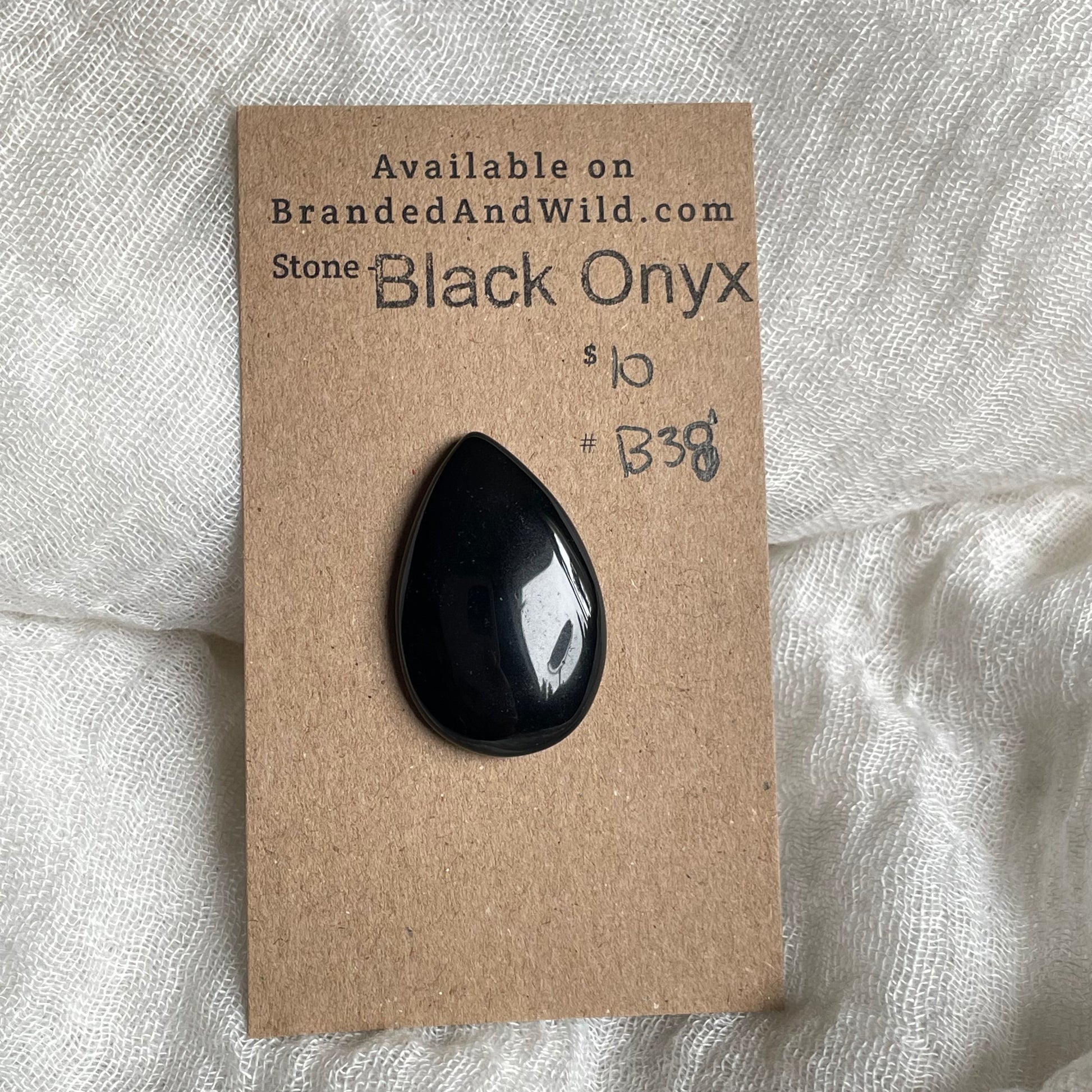 Black Onyx - Cabochon - B38 8383250B-AA7B-4E46-BA84-700A4A2B9D50 Brandedandwild.com