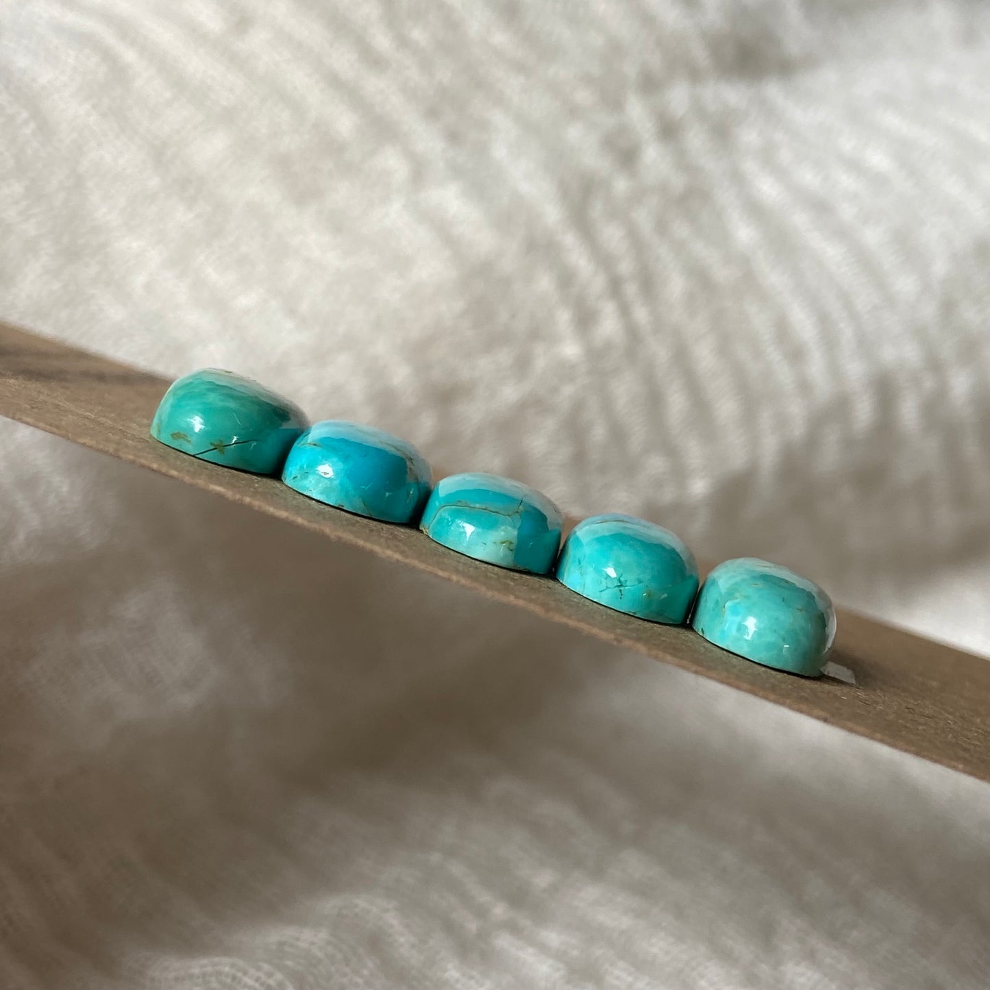 Kingman Turquoise Cabochon - KT23 8384418E-1F5A-4528-B5CD-8ED0E9FFC82A Brandedandwild.com