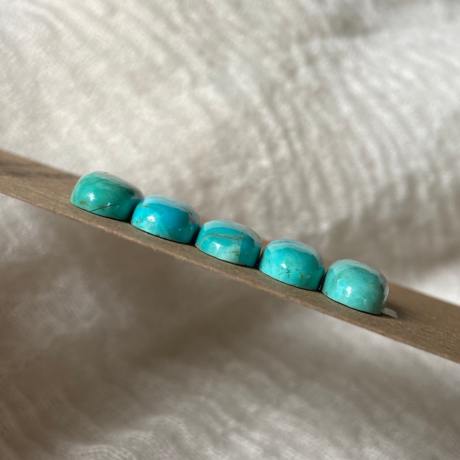 Kingman Turquoise Cabochon - KT23 8384418E-1F5A-4528-B5CD-8ED0E9FFC82A Brandedandwild.com