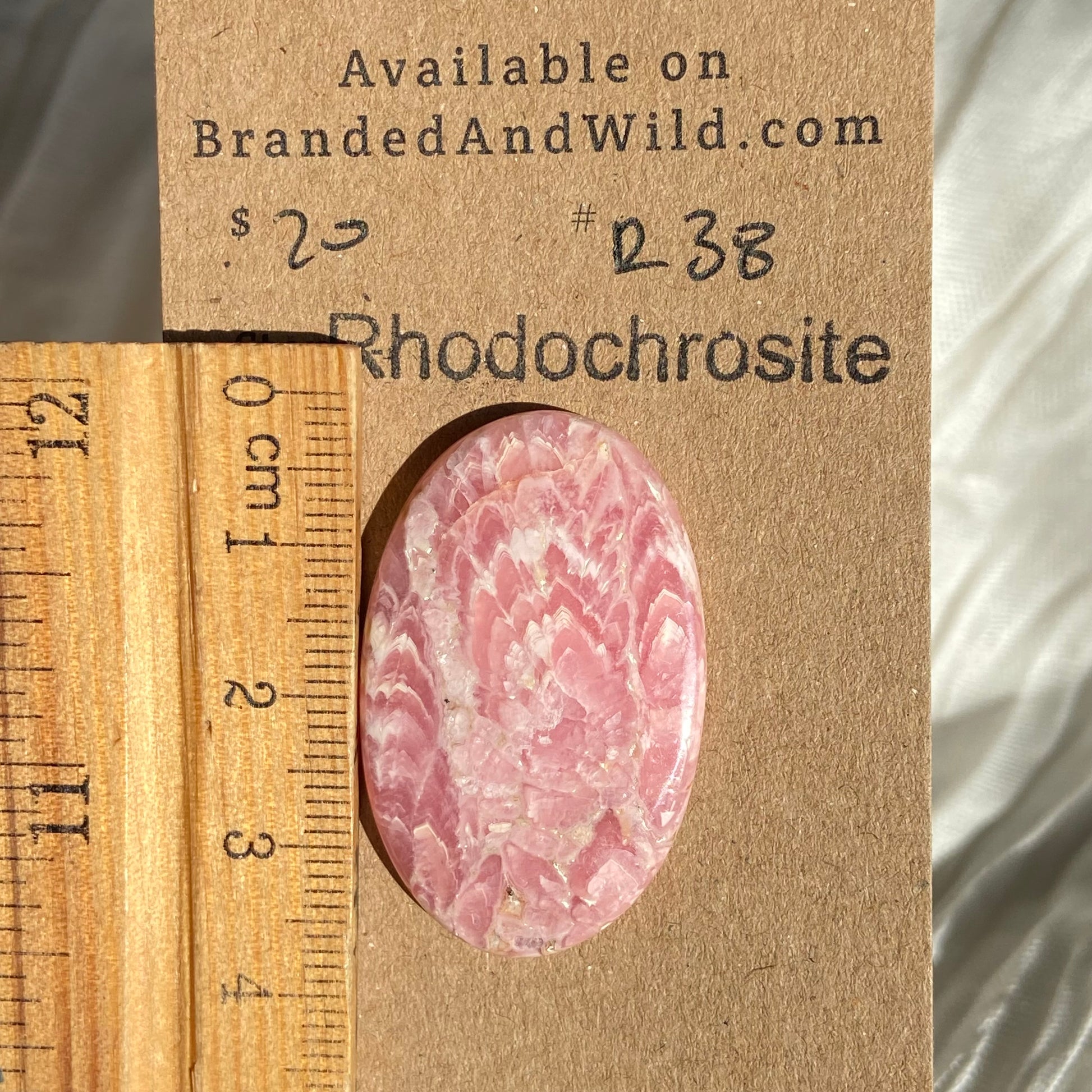Rhodochrosite Cabochon - R38 864CD45F-03EE-44AF-80D4-551F0E1AB15B Brandedandwild.com