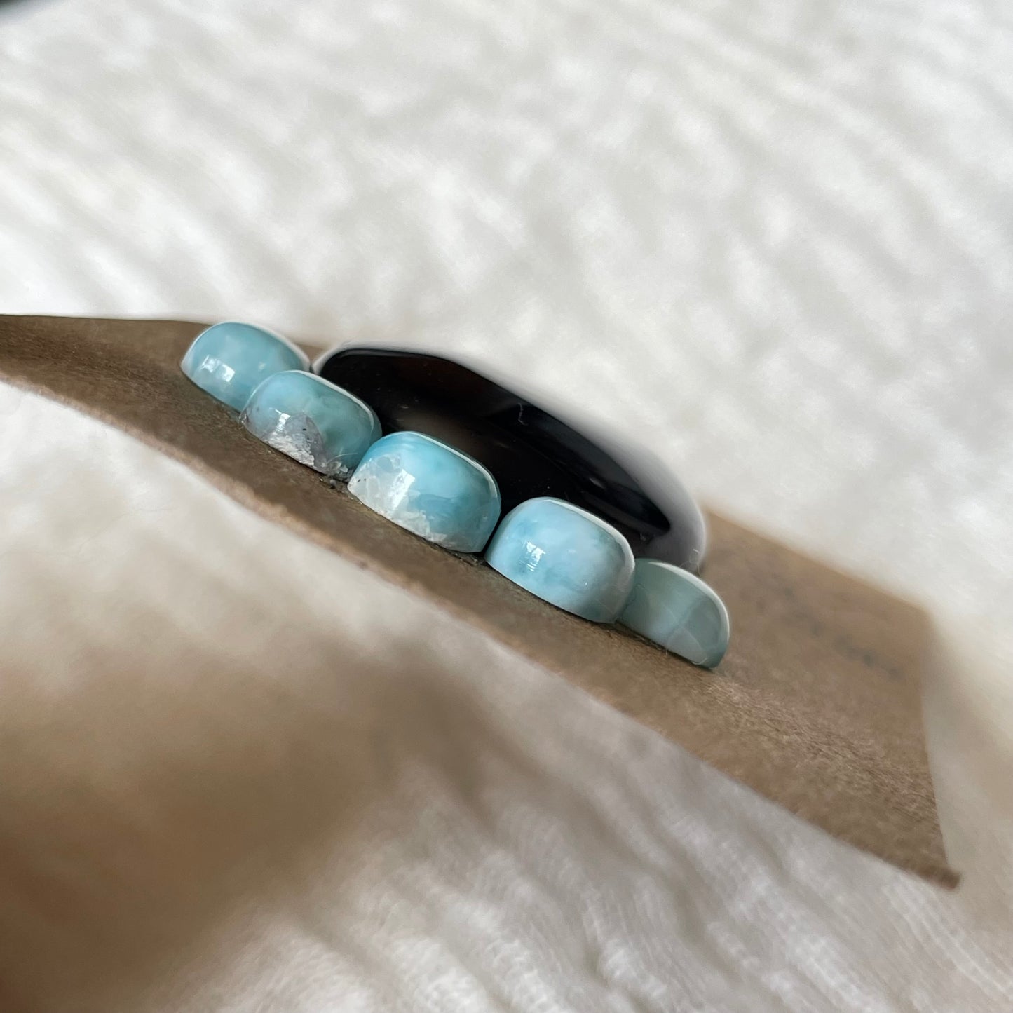 Larimar / Black Onyx Cabochon - Mix160 88C9A254-9142-4CFB-B3A2-1A95CBB47B9F Brandedandwild.com