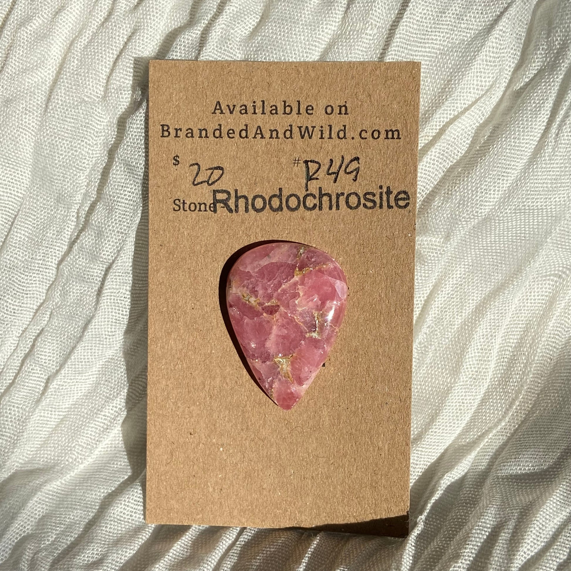 Rhodochrosite Cabochon - R49 8991989B-D864-4EBA-9404-9AD7B3DD0CBB Brandedandwild.com
